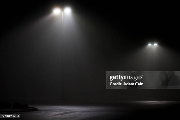 lamps in the fog - adam ray stock pictures, royalty-free photos & images