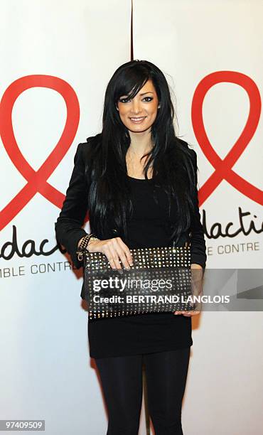 French TV Reality star Emilie Nefnaf poses as she arrives on March 3, 2010 in Paris at the start of the 16th edition of French Sidaction, an AIDS...