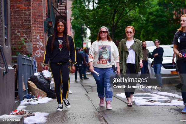 Tiffany Haddish, Melissa McCarthy and Elisabeth Moss seen on location for "The Kitchen" in the East Village on June 13, 2018 in New York City.