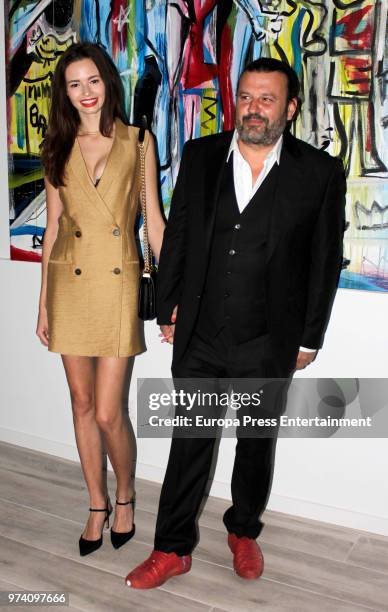 The artist Domingo Zapata and Marija Shatilo during the inauguration of the exhibition SMILE by Domingo Zapata and Alejandro Sanz on June 13, 2018 in...