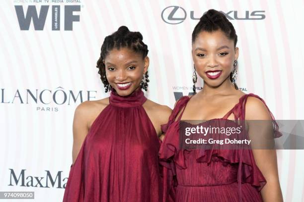 Halle Bailey and Chloe Bailey of Chloe X Halle attend Women In Film 2018 Crystal + Lucy Award at The Beverly Hilton Hotel on June 13, 2018 in Beverly...