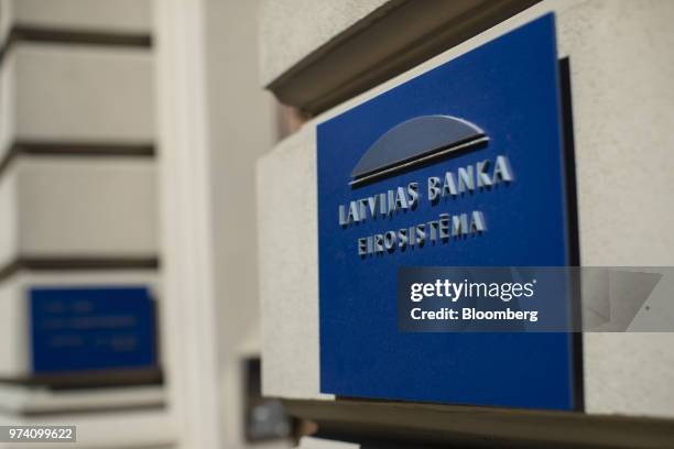 Sign adorns the Latvian central bank, also known as Latvijas Banka, ahead of the European Central Bank rate decision in Riga, Latvia, on Thursday,...