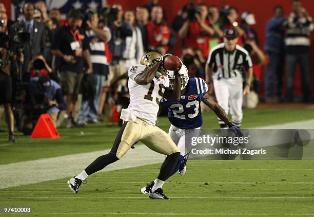 Devery Henderson of the New Orleans Saints makes a reception during Super Bowl XLIV against the Indianapolis Colts at Sun Life Stadium on February 7,...