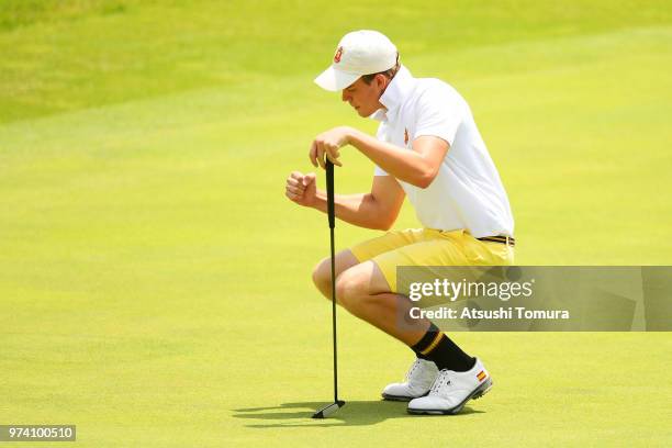 Eduard Rousaud Sabate of Spain celebrates after making his birdie putt on the 10th hole during the third round of the Toyota Junior Golf World Cup at...