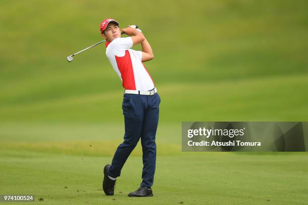 Keita Nakajima of Japan hits his second shot on the 13th hole during the third round of the Toyota Junior Golf World Cup at Chukyo Golf Club on June...