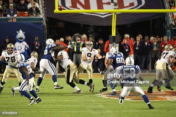 Drew Brees of the New Orleans Saints passes the ball during Super Bowl XLIV against the Indianapolis Colts at Sun Life Stadium on February 7, 2010 in...