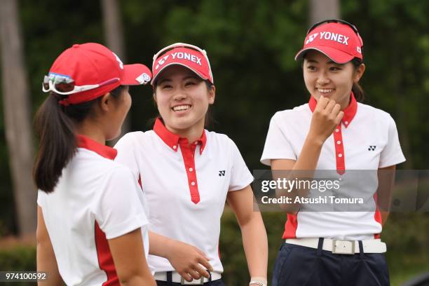 Ayaka Furue, Yuna Nishimura and Yuka Yasuda of Japan smile during the third round of the Toyota Junior Golf World Cup at Chukyo Golf Club on June 14,...