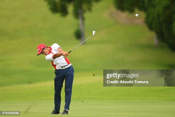 Kosuke Suzuki of Japan lines up his second shot on the 13th hole during the third round of the Toyota Junior Golf World Cup at Chukyo Golf Club on...