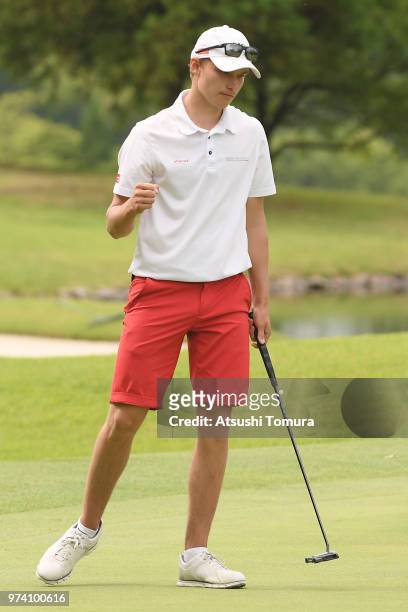 Rasmus Hojgaard of Denmark celebrates after making his biedie putt on the 18th hole during the third round of the Toyota Junior Golf World Cup at...