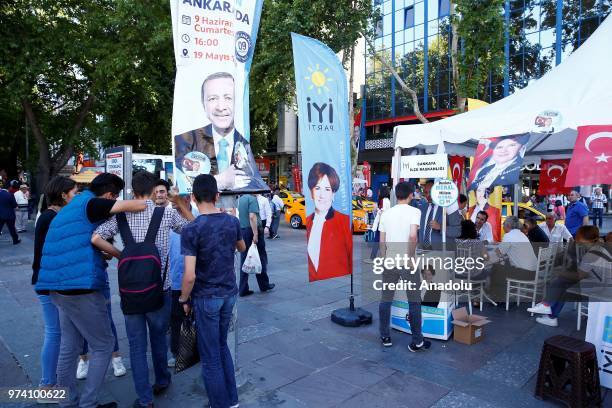 Citizens and officers of political parties gather around the election booths and tents of Turkish parties within the Turkeys presidential and general...