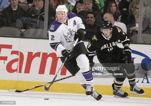 Matt Greene of the Los Angeles Kings controls the puck against the Dallas Stars on March 2, 2010 at the American Airlines Center in Dallas, Texas.