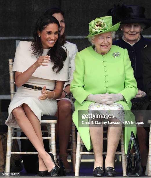 Queen Elizabeth II and the Duchess of Sussex at the opening of the new Mersey Gateway Bridge, in Widnes, Cheshire.