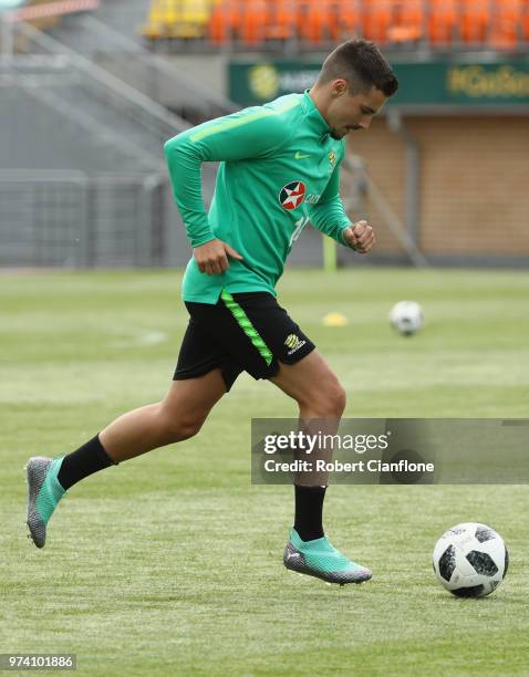 Jamie Maclaren of Australia runs with the ball during an Australia Socceroos training session ahead of the FIFA World Cup 2018 at Stadium Trudovye...