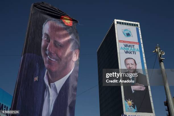 Campaign poster of presidential candidate of Justice and Development Party, Recep Tayyip Erdogan and campaign poster of presidential candidate of...