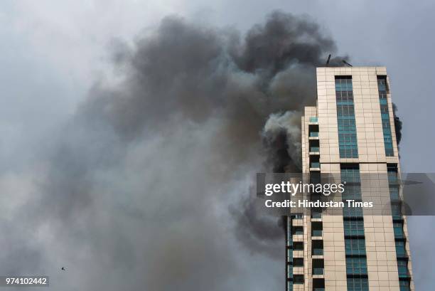 Major fire breaks out at BeauMonde Towers at Prabhadevi, on June 13, 2018 in Mumbai, India. Two firemen had to be hospitalised after a major blaze...