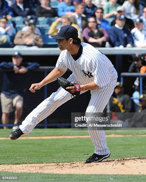 Pitcher Sergio Mitre of the New York Yankees throws against the Pittsburgh Pirates March 3, 2010 at the George M. Steinbrenner Field in Tampa,...