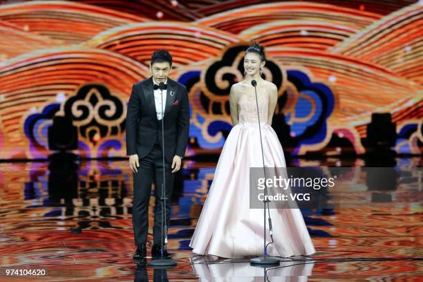 Actor Huang Xiaoming and actress Jelly Lin Yun attend the opening ceremony of the 1st Shanghai Cooperation Organisation Film Festival on June 13,...