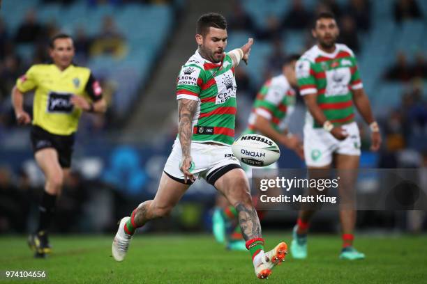 Adam Reynolds of the Rabbitohs kicks during the round 15 NRL match between the Parramatta Eels and the South Sydney Rabbitohs at ANZ Stadium on June...
