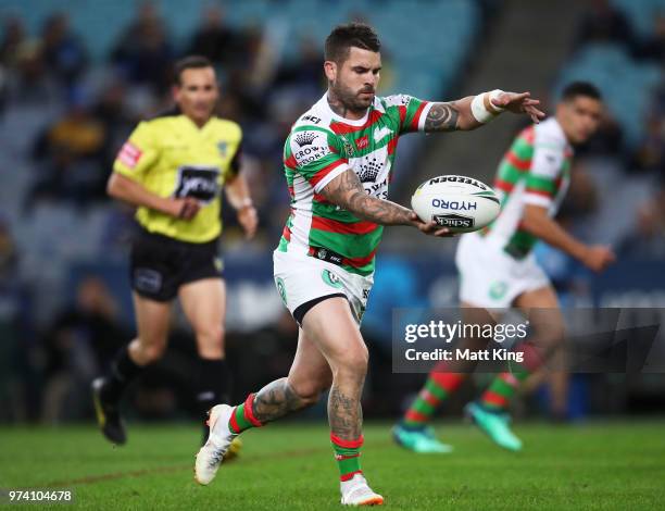 Adam Reynolds of the Rabbitohs kicks during the round 15 NRL match between the Parramatta Eels and the South Sydney Rabbitohs at ANZ Stadium on June...