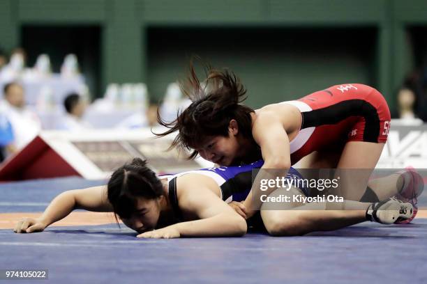 Mayu Mukaida competes against Saki Igarashi in the Women's 55kg final on day one of the All Japan Wrestling Invitational Championships at Komazawa...