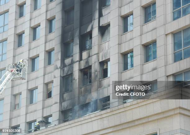 At noon on June 14 is located in China's zhejiang province hangzhou a downtown office building fire, according to field the fire starting point for...
