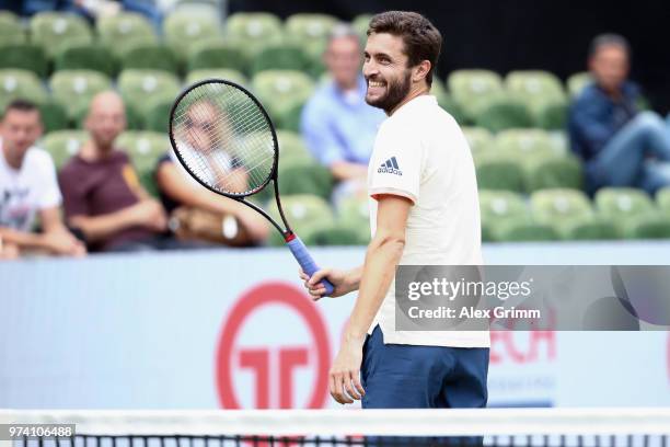 Gilles Simon of France reacts during his match against Feliciano Lopez of Spain during day 4 of the Mercedes Cup at Tennisclub Weissenhof on June 14,...