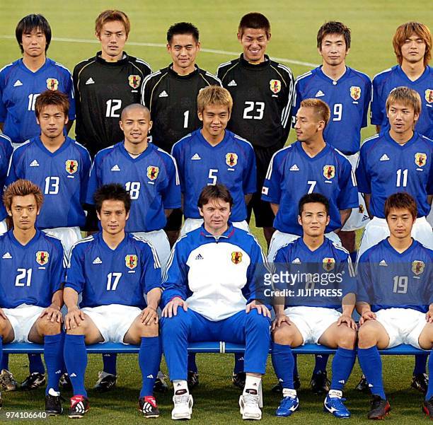 Japanese national team members pose for photo session prior to their training session at a stadium in Iwata city, central Japan 21 May 2002. Kazuyuki...