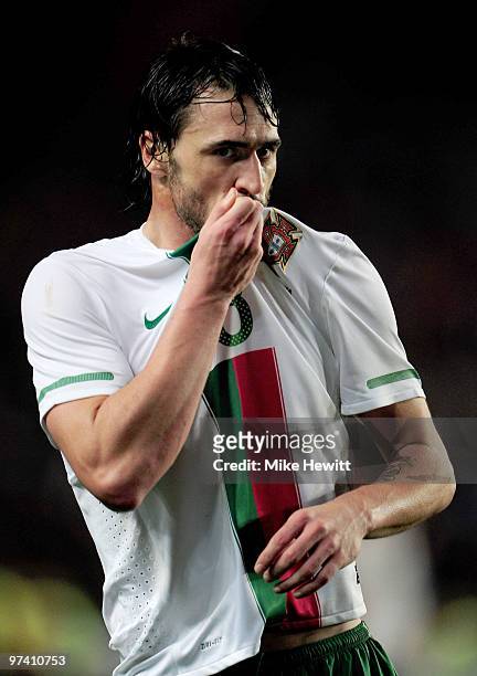 Hugo Almeida of Portugal kisses his shirt after scoring during the International Friendly match between Portugal and Republic of China at the City of...