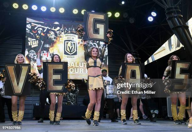 Members of the Vegas Golden Knights Golden Aces cheer during the team's "Stick Salute to Vegas and Our Fans" event at the Fremont Street Experience...