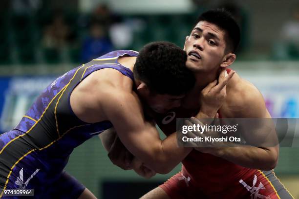 Masato Sumi competes against Taichi Oka in the Men's Greco-Roman style 87kg final on day one of the All Japan Wrestling Invitational Championships at...