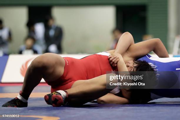 Naruha Matsuyuki competes against Mei Shindo in the Women's 72kg final on day one of the All Japan Wrestling Invitational Championships at Komazawa...