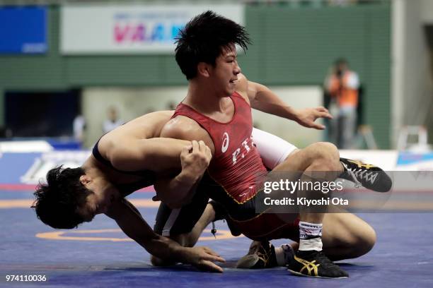 Kazuya Koyanagi competes against Shingo Arimoto in the Men's Freestyle 61kg final on day one of the All Japan Wrestling Invitational Championships at...