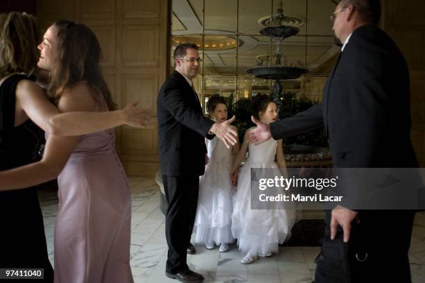 Friends greet each other at the Broadmoor Hotel on May 16, 2008 in Colorado Springs, Colorado. The annual Father-Daughter Purity Ball, founded in...