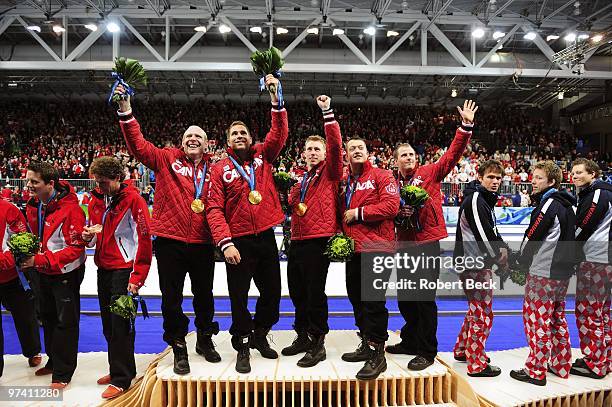 Winter Olympics: Canada skip Kevin Martin, John Morris, Marc Kennedy, Ben Hebert and Adam Enright victorious with gold medals after Men's Gold Medal...