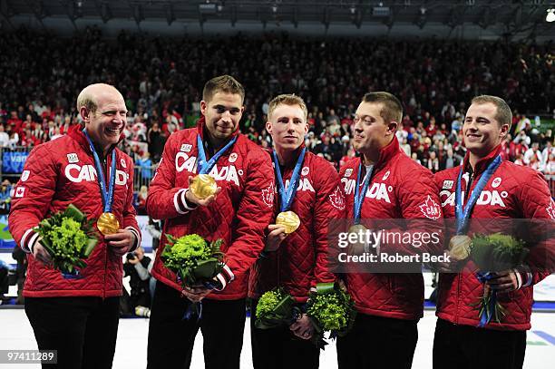 Winter Olympics: Canada skip Kevin Martin, John Morris, Marc Kennedy, Ben Hebert and Adam Enright victorious with gold medals after Men's Gold Medal...