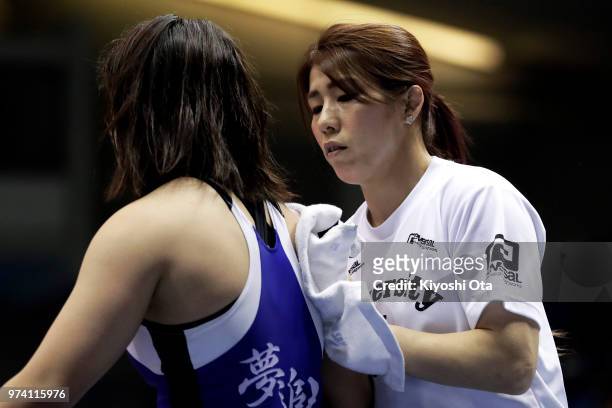 Saori Yoshida is seen while Tomoha Uchijo competes against Nao Taniyama in the Women's 55kg first round match on day one of the All Japan Wrestling...