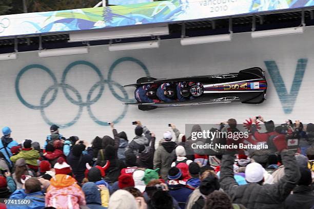 Winter Olympics: USA Team 1 Steven Holcomb, Steve Mesler, Curtis Tomasevicz, and Justin Olsen in action during Men's Bobsled Four Man Heat 3 at...