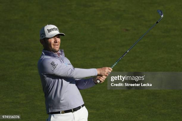 Branden Grace of South Africa plays a shot on the tenth hole during the first round of the 2018 U.S. Open at Shinnecock Hills Golf Club on June 14,...