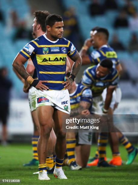 Josh Hoffman of the Eels and team mates look dejected after a Rabbitohs try during the round 15 NRL match between the Parramatta Eels and the South...