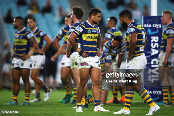 Josh Hoffman of the Eels and team mates look dejected after a Rabbitohs try during the round 15 NRL match between the Parramatta Eels and the South...