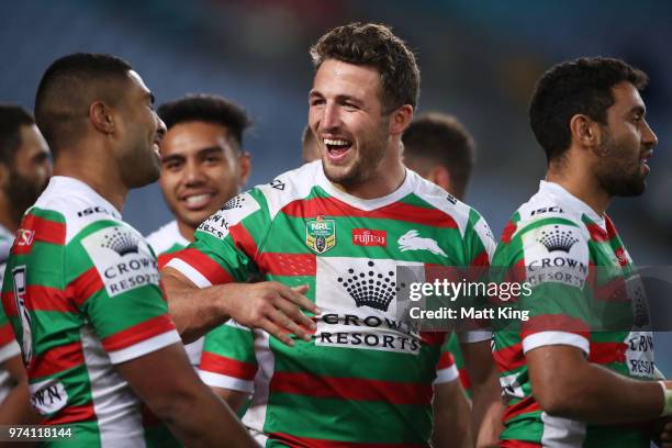 Robert Jennings of the Rabbitohs celebrates with Sam Burgess after scoring a try during the round 15 NRL match between the Parramatta Eels and the...