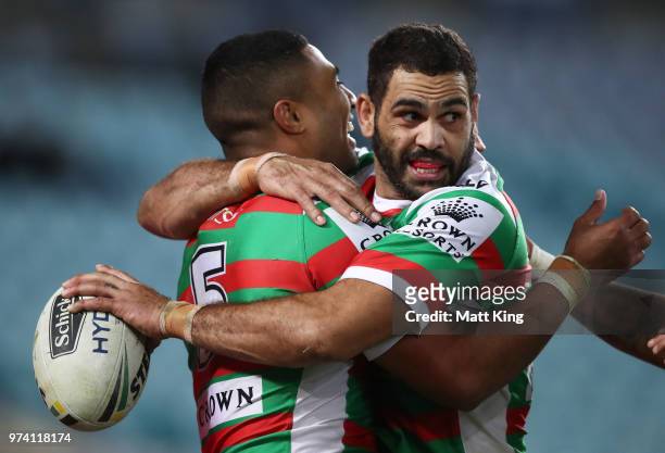 Robert Jennings of the Rabbitohs celebrates with Greg Inglis after scoring a try during the round 15 NRL match between the Parramatta Eels and the...