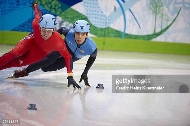 Short Track Speed Skating: 2010 Winter Olympics: USA Apolo Anton Ohno in action during Men's 500M Final at Pacific Coliseum. Ohno was disqualified...