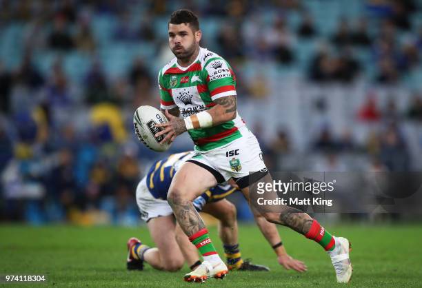 Adam Reynolds of the Rabbitohs makes a break during the round 15 NRL match between the Parramatta Eels and the South Sydney Rabbitohs at ANZ Stadium...
