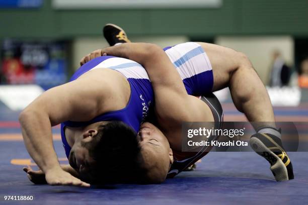 Arata Sonoda competes against Hirotake Tsuda in the Men's Greco-Roman style 130kg semifinal match on day one of the All Japan Wrestling Invitational...