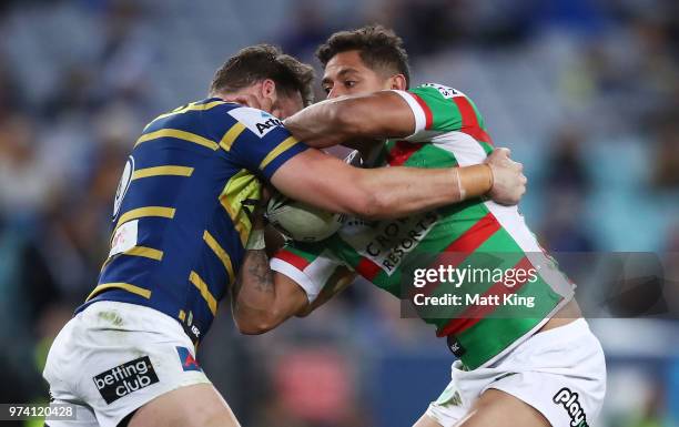 Dane Gagai of the Rabbitohs is tackled during the round 15 NRL match between the Parramatta Eels and the South Sydney Rabbitohs at ANZ Stadium on...