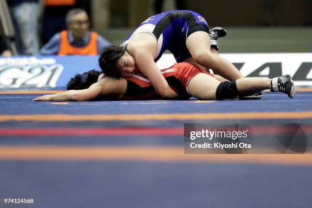 Saki Igarashi competes against Umi Imai in the Women's 55kg semifinal match on day one of the All Japan Wrestling Invitational Championships at...