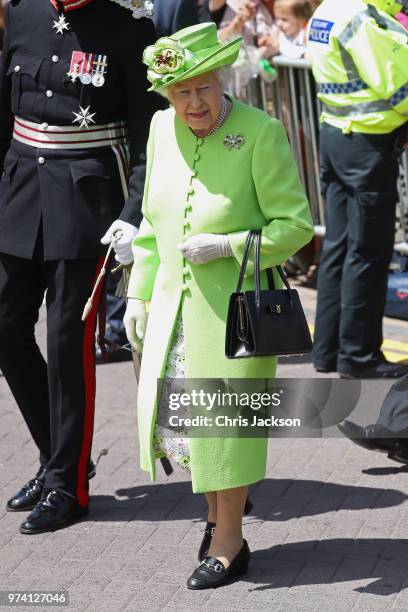 Queen Elizabeth II and Meghan, Duchess of Sussex visit Chester Town Hall on June 14, 2018 in Chester, England. Meghan Markle married Prince Harry...