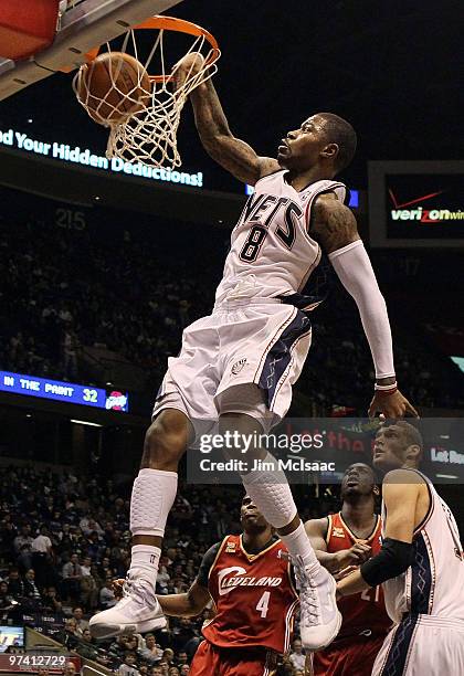 Terrence Williams of the New Jersey Nets dunks against the Cleveland Cavaliers at the Izod Center on March 3, 2010 in East Rutherford, New...