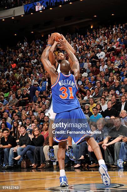 Rashard Lewis of the Orlando Magic takes a jump shot against Jawad Williams of the Cleveland Cavaliers during the game on February 21, 2010 at Amway...